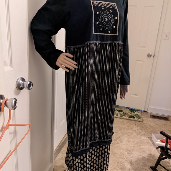 Studio X medium black dress with star sign and wooden beads on bodice. - Picture 2 of 4